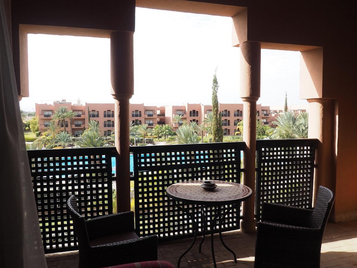 Kenzi Menara Palace & Resort Marrakesh Bagian luar foto A balcony at the hotel