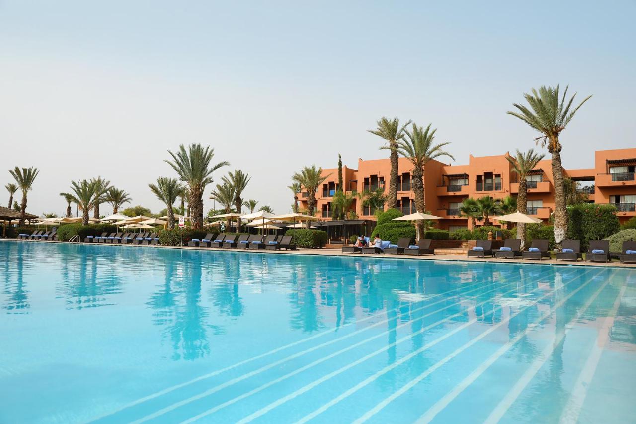 Kenzi Menara Palace & Resort Marrakesh Bagian luar foto The swimming pool at the hotel